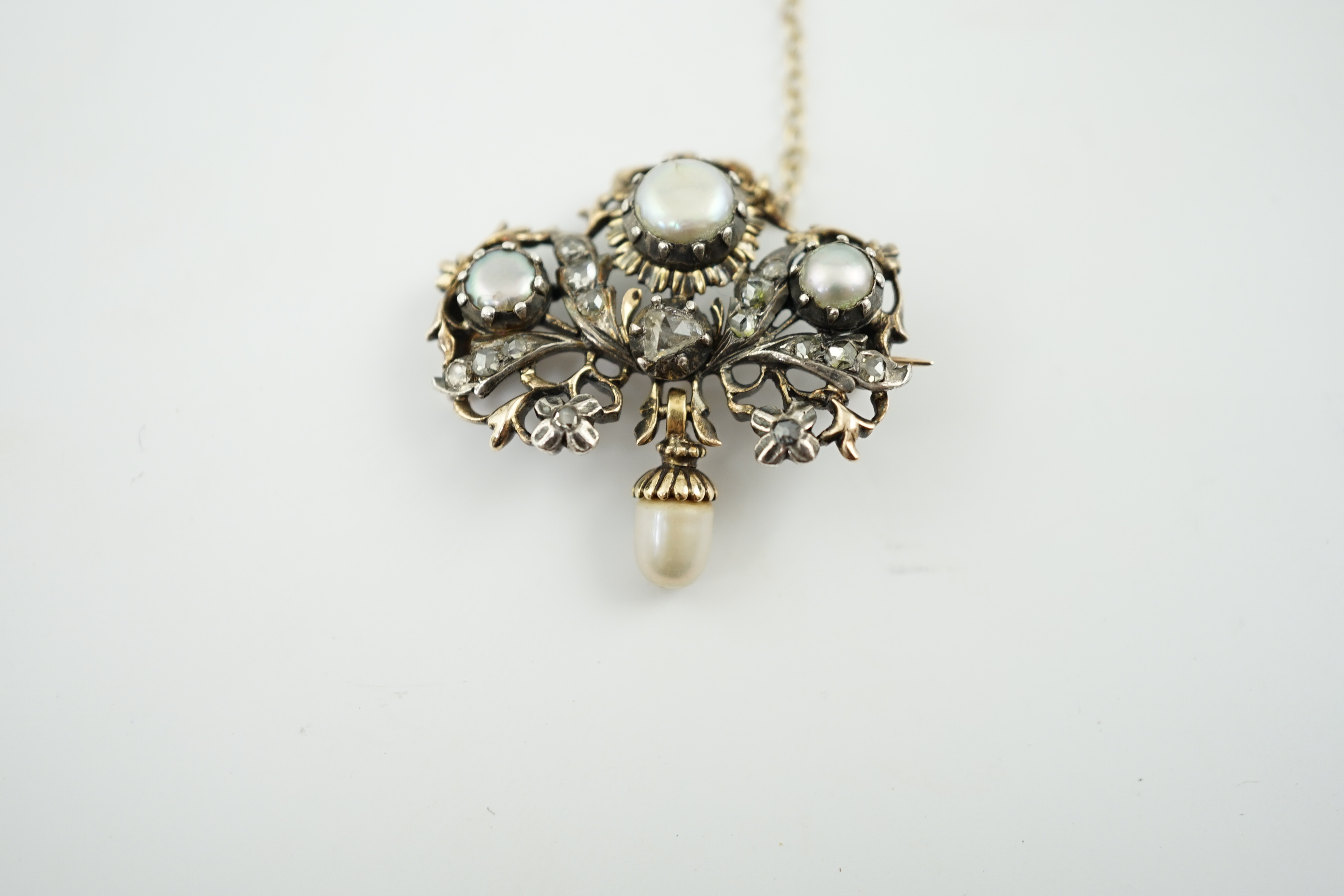 A Victorian gold and silver, button pearl and rose cut diamond cluster set drop brooch